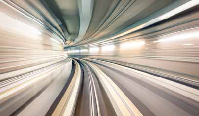 Subway metro underground tunnel with blurry rail tracks in gallery